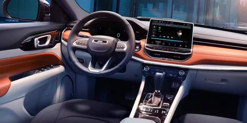 Steering wheel and touchscreen display